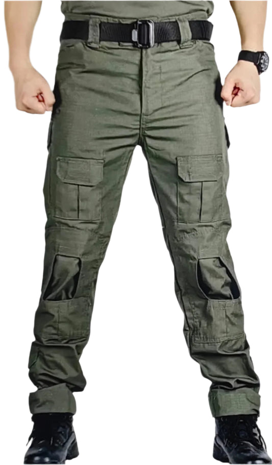 Green cargo pants worn by a person on a white background