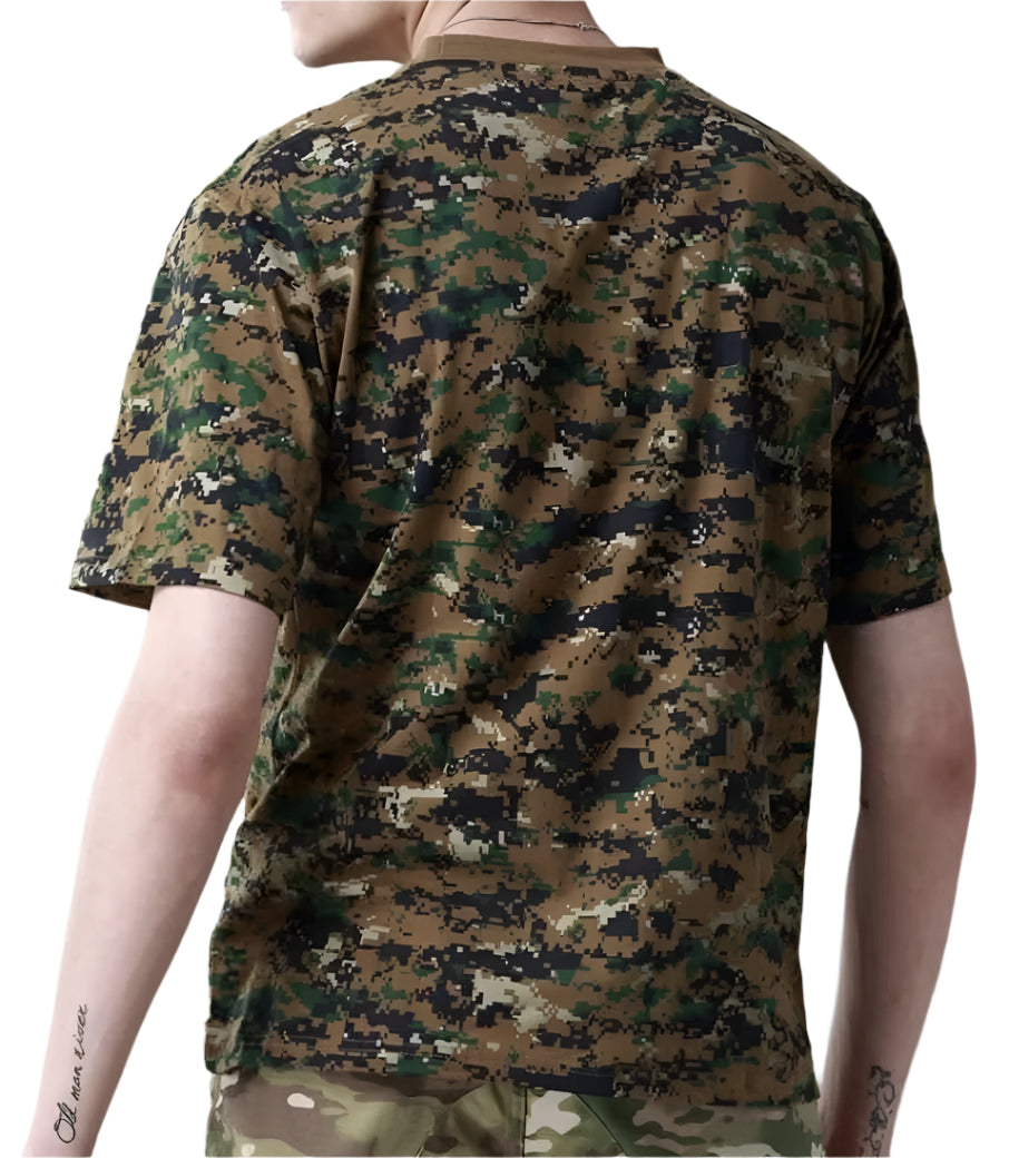 Person wearing a camouflage t-shirt and pants on a gray background