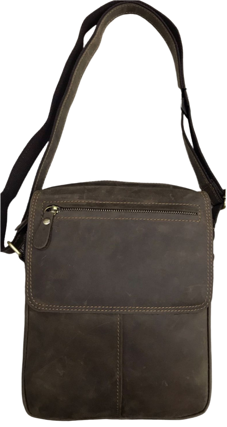 A brown genuine leather sling bag displayed from two angles, showing the front and back, with a shoulder strap and a zipper closure.