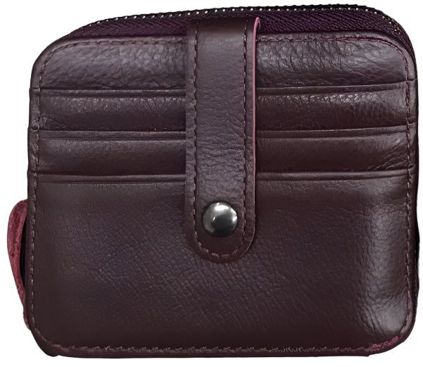 Collection of leather cardholders in black, brown, and maroon on a wooden surface.