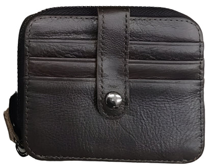 Collection of leather cardholders in black, brown, and cherry on a wooden surface.