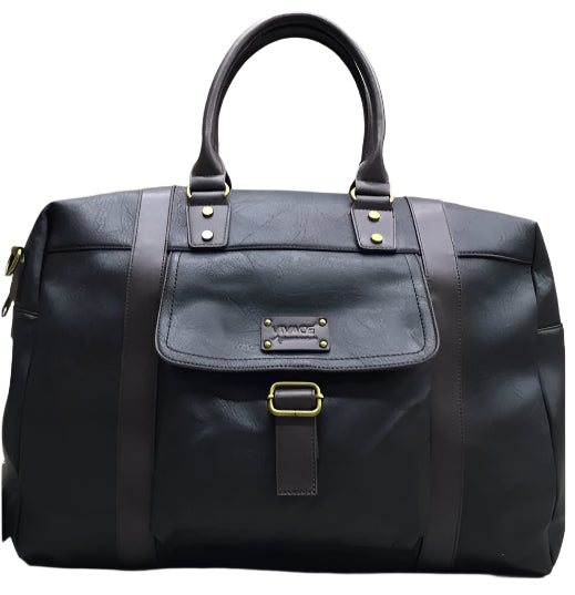 Black leather handbag with gold accents on a wooden surface