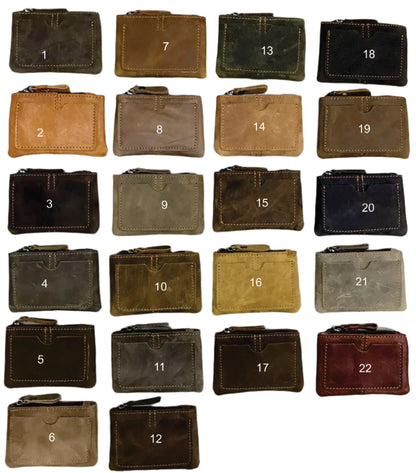 Collection of various leather coin bags displayed on a wooden board with dimensions and product code.